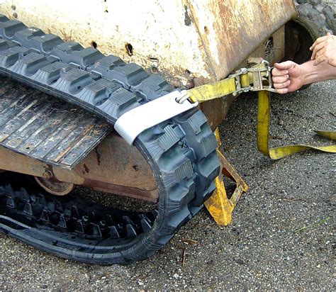 how to change tracks on skid steer|skid steer track replacement cost.